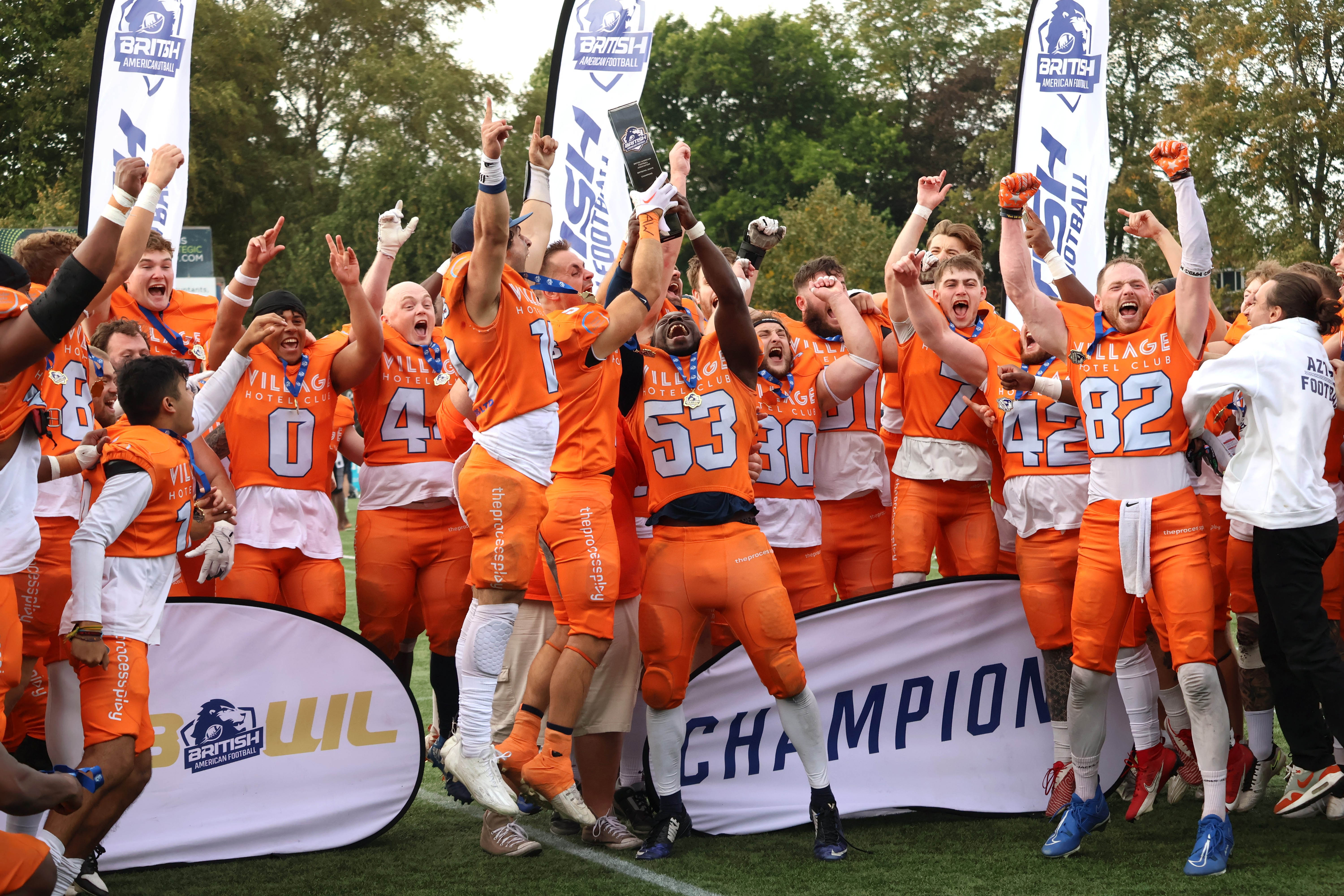 The Aztecs celebrate with their trophy!